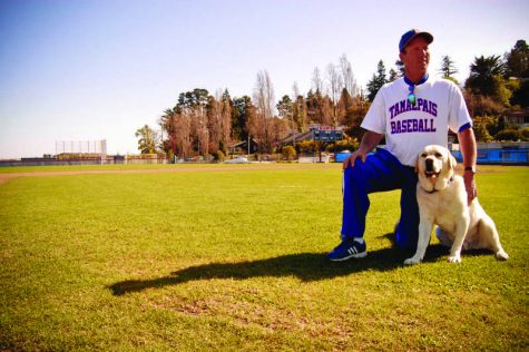 Yellow lab assists varsity baseball