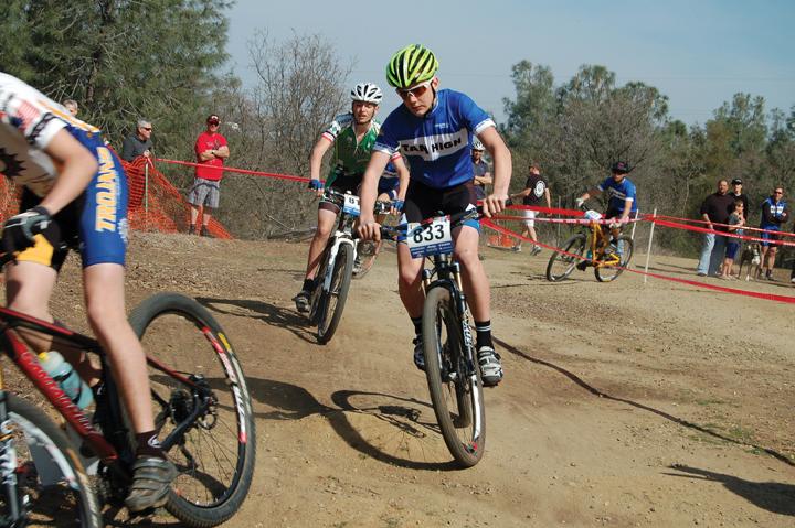 HOT ON HIS TAIL: Freshman Clayton Puckett prepares to pass a Terra Linda rider at a race in Folsom, CA on March 10. Photo courtesy of: Cody Duane-McGlashan