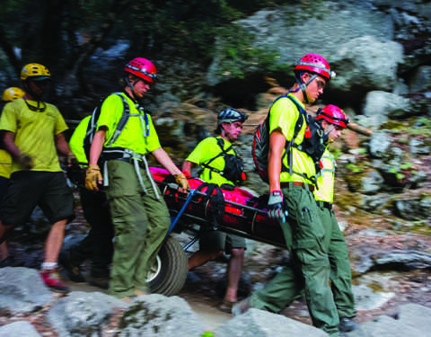 TO THE RESCUE: Due to the rocky terrain in which hikers are often lost or injured, SAR teams use specialized equipment on missions. Photo courtesy of: Rich Shelton