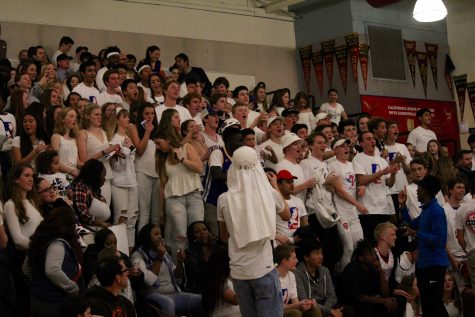 Boys’ Varsity Basketball Team Loses to Redwood at Home “White Out” Game