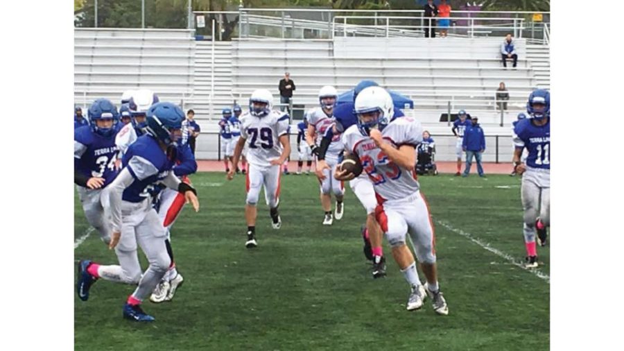 Hutson carries the ball