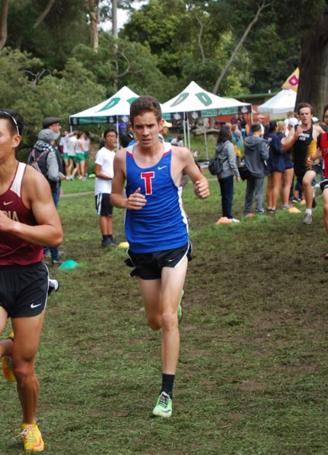 Junior Tomo Sharber competes in a cross country meet. (Courtesy of Michael Sharber)