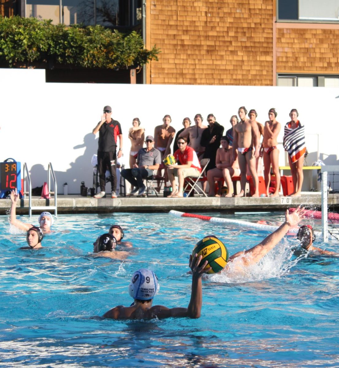 No. 9 Andrew Sternfels passes the ball during the NCS championship waterpolo game. 