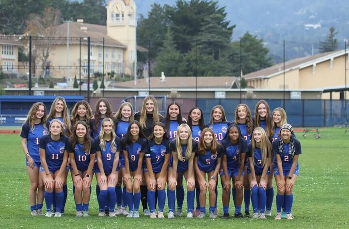The Tam girls soccer team poses for their media day photo.