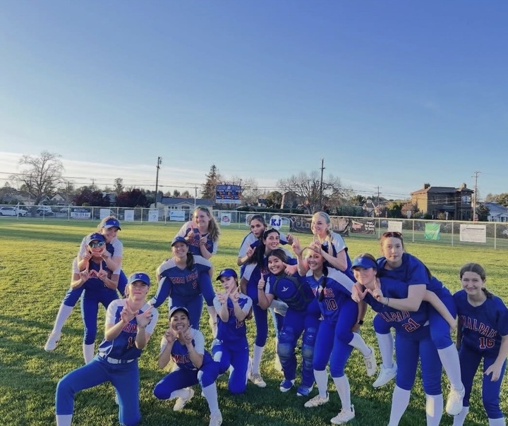 The Hawks celebrate a 9-0 win over the Petaluma Trojans